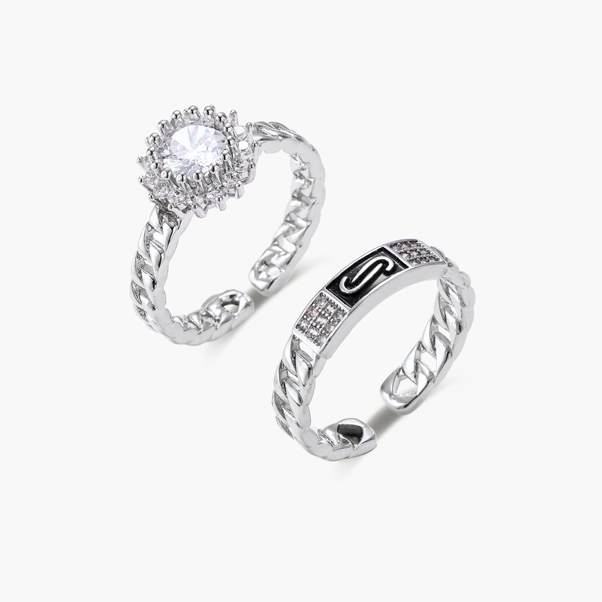 Two adjustable white gold plated rings with chain-link bands, featuring cubic zirconia halo and enamel details